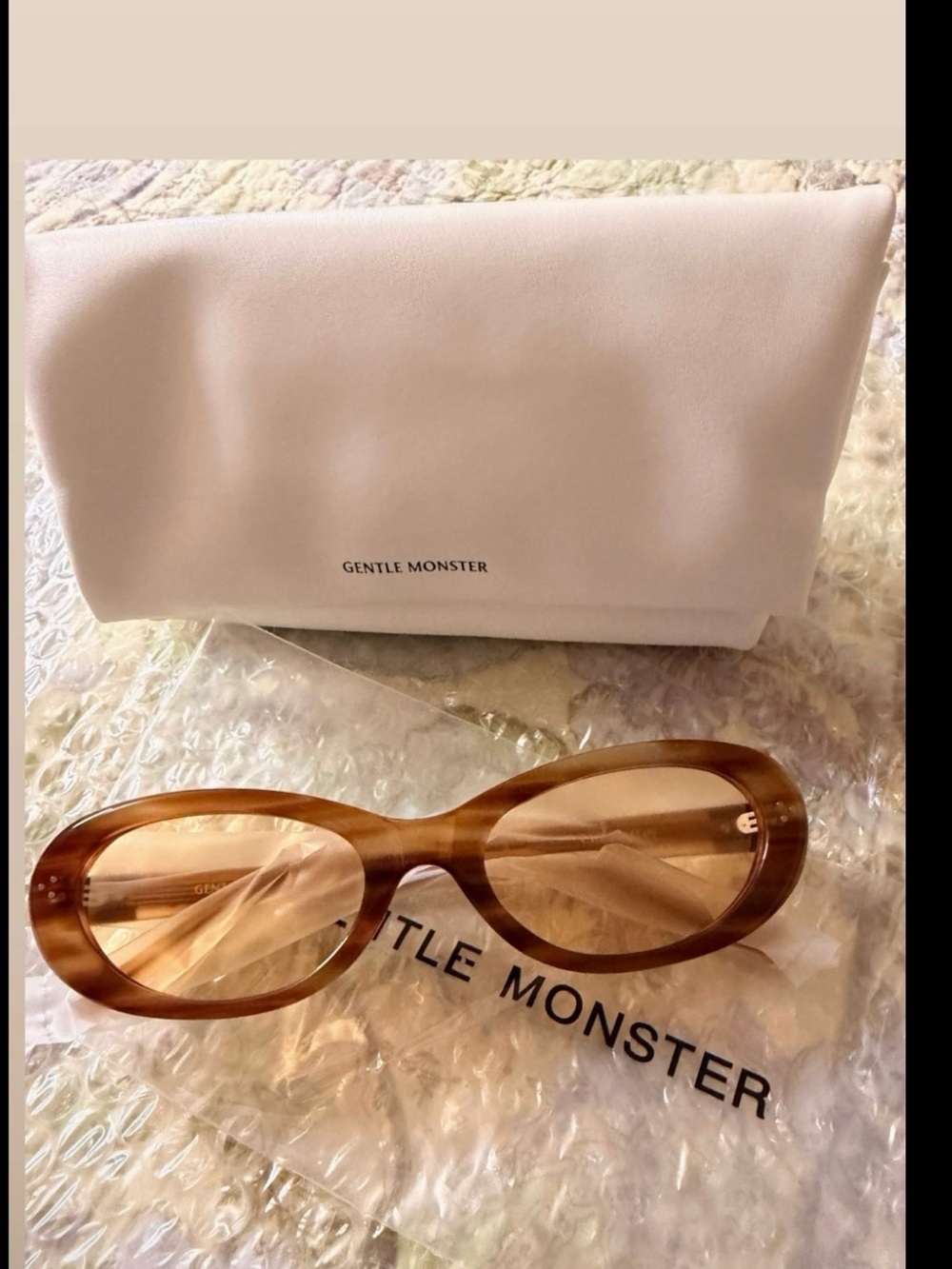 GENTLE MONSTER Amber Brown Oval Sunglasses